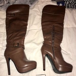 Brown high heeled boots